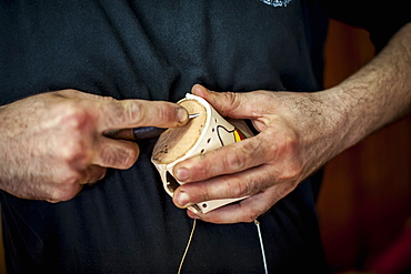 Close Up Of A Man's Hands Making Handicrafts With A Tool, Pelotas, Rio Grande Do Sul, Brazil