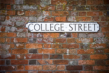 Sign For College Street On A Brick Wall, Winchester, Hampshire, England