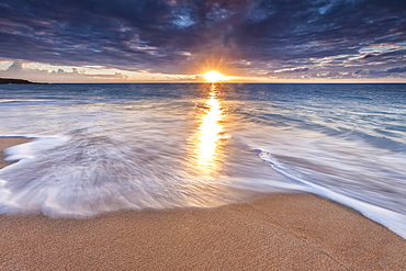 Sunlight Reflected On The Ocean To The Sandy Shore At Sunset, Molokai, Hawaii, United States Of America