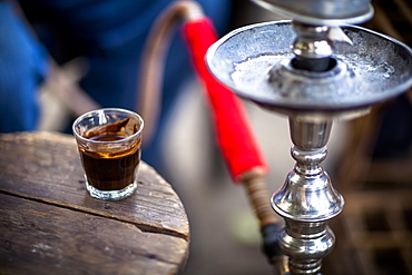 A Glass Of Turkish Coffee Sits By A Sheesha In A Small Village Near Luxor, Egypt