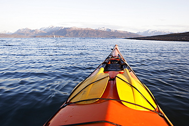 The Tip Of A Canoe Pointing Towards The Kenai Mountains, Kachemak Bay State Park, Alaska, United States Of America