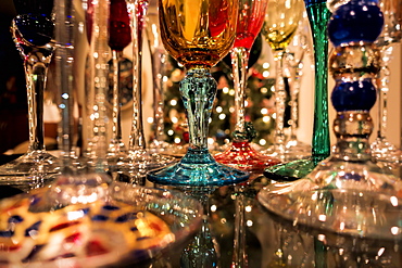 Reflections Of Christmas Tree Lights And Champagne Flutes Sparkle On Shiny Granite Counter, Anchorage, Alaska, United States Of America