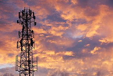 Silhouette Of A Communications Tower With Glowing Pink Clouds At Sunset, Brantford, Ontario, Canada