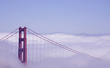 San Francisco, California; Golden Gate Bridge In Fog