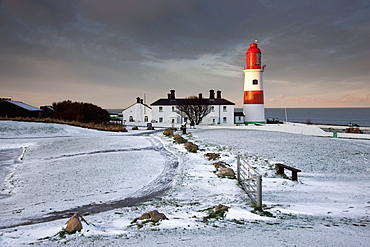 South Shields, Tyne And Wear, England; A Lighthouse And House Along The Coast