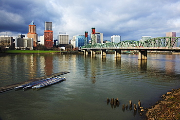 Portland, Oregon, United States Of America; Boats Along A Pier On Willamette River And Downtown Portland