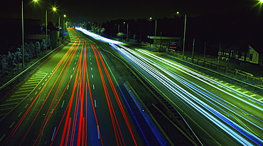 Light Trails Down A Busy Road At Night; Dublin, Ireland