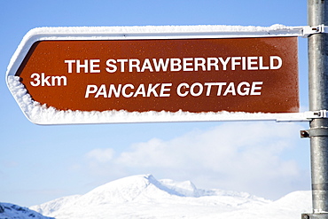 Close-Up Of Road Sign Directions To Restaurant In Killarney National Park; Killarney County Kerry Ireland