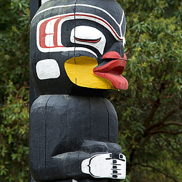 Totem Pole Painted In Colour, Vancouver, British Columbia, Canada