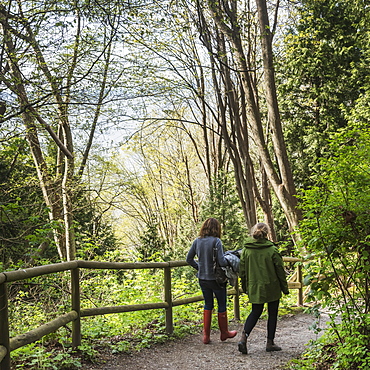 Two Women Walking On Foreshore Trail, Vancouver, British Columbia, Canada