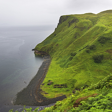 Fog Over The Ocean And Lush Foliage Covered Slopes Along The Coast, Lealt Falls Canyon, Portree, Scotland