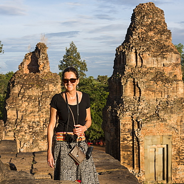 A Woman Stands Posing For The Camera At Pre Roup Temple, Krong Siem Reap, Siem Reap Province, Cambodia