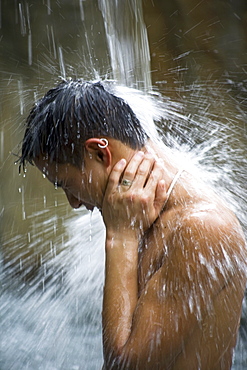 Man Under Waterfall