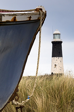 Abandoned Boat And Lighthouse, Humberside, England