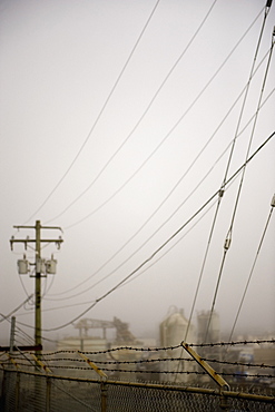 Power Station Surrounded By Barbed Wire Fences