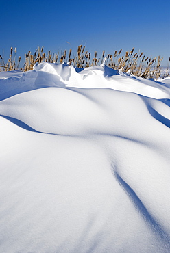 Snow Drifts On A Hill