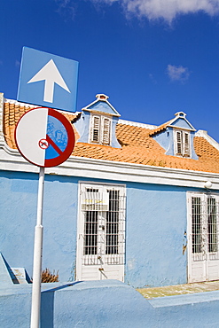 Blue Building With Sign Outside