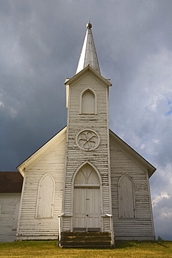 Weathered Church And Dark Skies