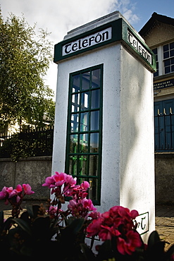 A Telephone Booth With A Sign 'telefon'