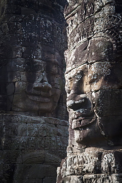 Face sculptures on stone walls at angkor wat, Cambodia