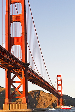 Tour Boats Cross Under Golden Gate Bridge, Viewed From Fort Point At The Entrance To San Francisco Bay, Marin Headlands Visible In Background, San Francisco, California, United States Of America