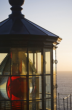 The Sun Sets At Cape Meares Lighthouse, Oregon, United States Of America