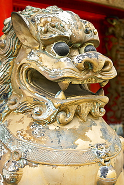 Close Up Of A Statue Of A Lion With Peeling Paint, Honolulu, Oahu, Hawaii, United States Of America