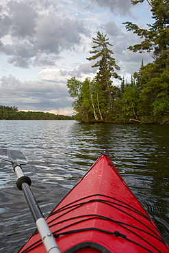 Kayaking In A Tranquil Lake At Sunset, Ontario, Canada