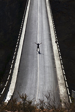 Silhouette Of Man On High Bridge, Lijiang, Yunnan Province, China