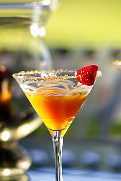 Hawaii, Maui, A Tropical Mango Martini With Strawberry Garnish.