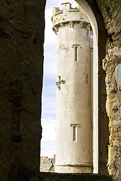 Castle Turret Framed In Large Window Of Stone Wall, Clifden, County Galway, Ireland