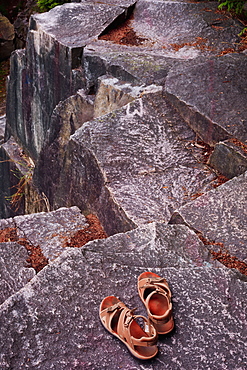 Sandals Sitting On A Rock Ledge, Vancouver, British Columbia, Canada