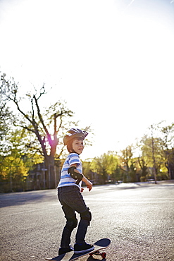 Young Boy Riding A Skateboard, Montreal, Quebec, Canada