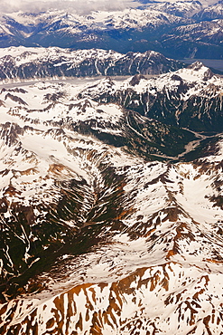 Aerial Perspective Of Glaciers, Fjords, And Snow-Covered Moutains In The Aleutian Range, Alaska Peninsula, Southwestern Alaska, USA, Summer