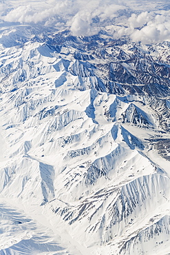 Aerial View Of Snow Covered Mountains In The Alaska Range, Interior Alaska, USA, Winter