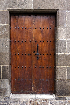 Sixteenth Century Brown Wooden Door, With Iron Fastenings, Set In Stone Doorway, Las Palmas Gran Canaria, Canary Islands, Spain