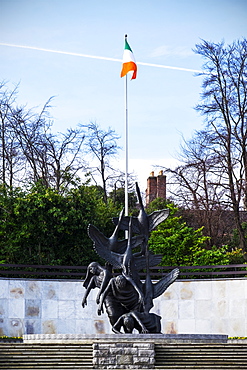 Children Of Lir Sculpture And The Republic Of Ireland Flag In The Garden Of Rememberance, Parnell Square, Dublin, Ireland