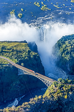 Aerial View Of Victoria Falls Behind Bridge, Botswana