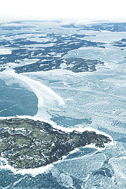 Aerial View Of The Frozen Water And Landscape In Winter, Alaska, United States Of America