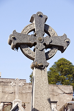 Buenos Aires, Argentina; A Stone Cross On A Tomb In Recoleta Cemetery