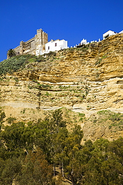 Arcos De La Frontera, Andalusia, Spain; A View Of The Old Town On Top Of A Cliff