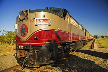 Commuter train moving on railroad track