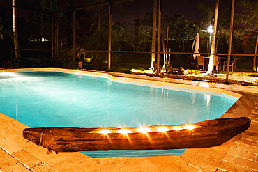 Swimming pool lit up at night