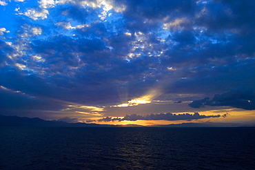 Cloudscape over the sea at dusk, Milne Bay, Papua New Guinea