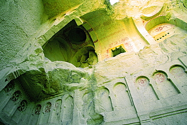 Low angle view of the old ruins of a cave church, Zelve Valley, Cappadocia, Turkey