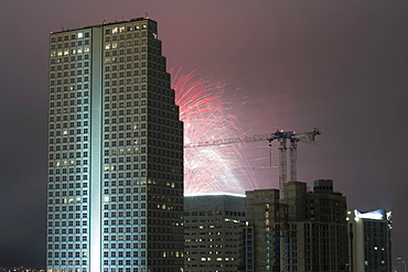 Low angle view of buildings lit up at night, Miami, Florida, USA