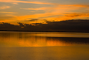 Reflection of clouds in water, St. Augustine Beach, Florida, USA