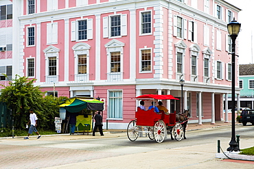 Horse cart moving on the road, Bay Street, Nassau, Bahamas