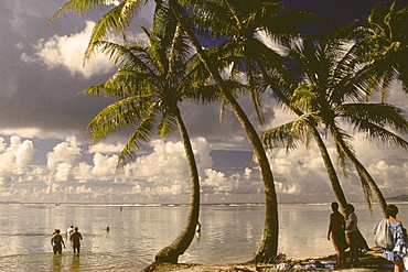 Tourist on the beach, Raiatea Island, Society Islands, French Polynesia