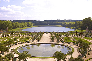 High angle view of a formal garden in front of a palace, Palace of Versailles, Versailles, France